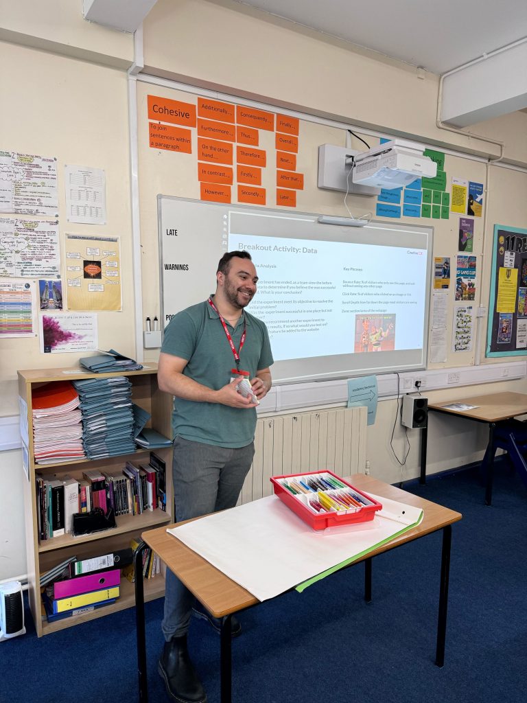 Lewis Tucker presenting digital data during the Breakout Activity workshop on careers day 
