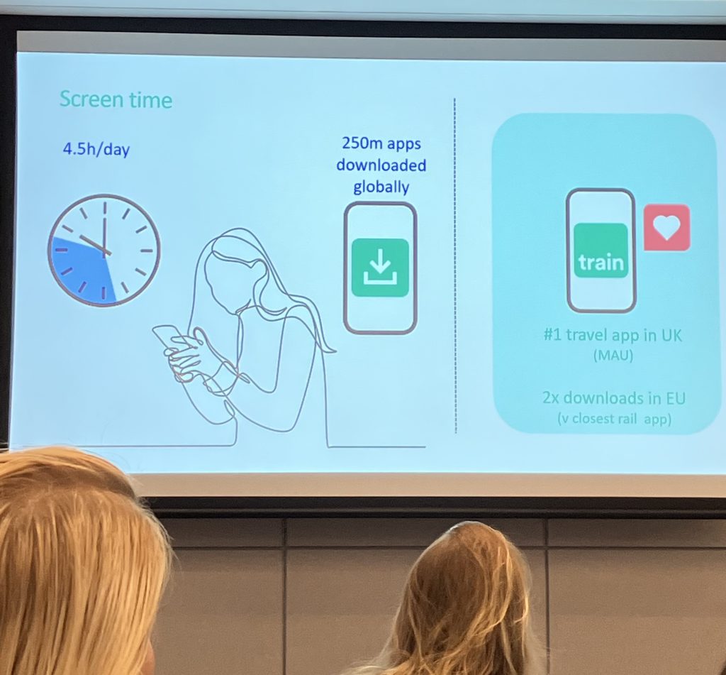 One of Hannah's slides showing the average persons screen time. The left is a clock that states that the average persons screen time is 4.5h a day. The middle shows that 250m apps are downloaded globally, and Trainline is the #1 travel app in the UK. 